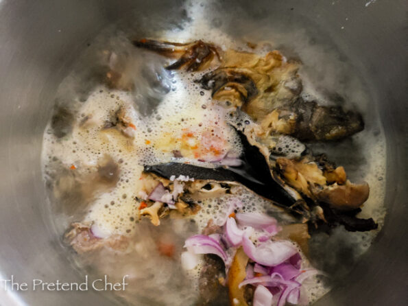 Soup broth in a pot