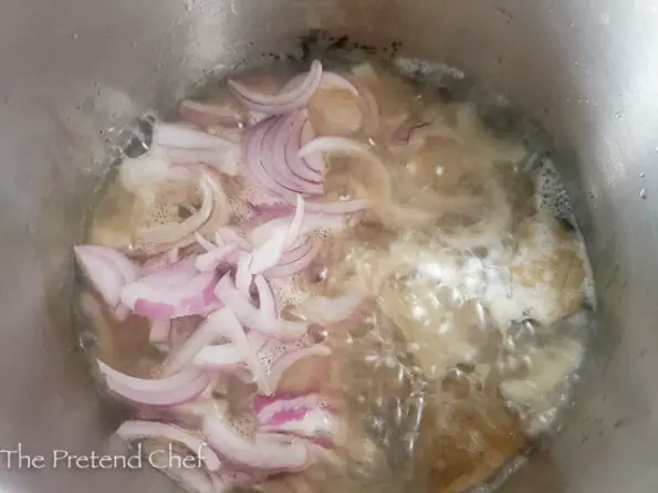 onions frying in oil