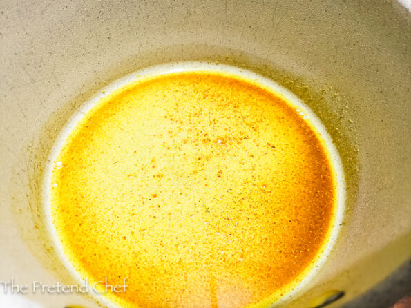 Curry frying in a pot