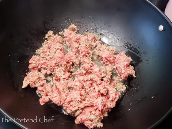 minced meat frying over medium high heat