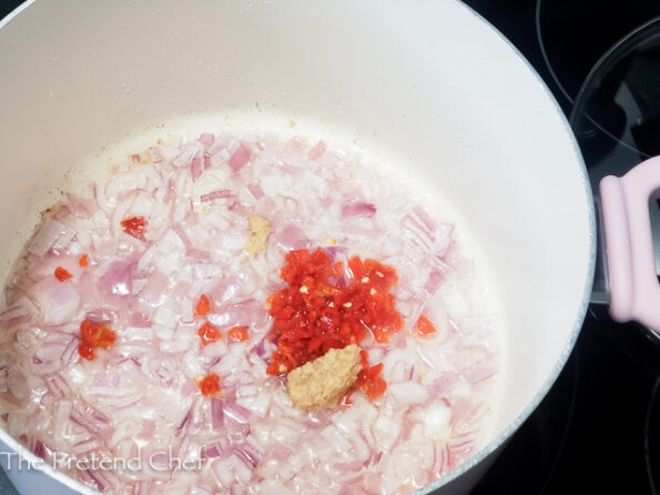 chopped onions and pepper frying in oil