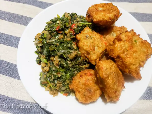 Delicious callaloo and saltfish with fried Dumplings